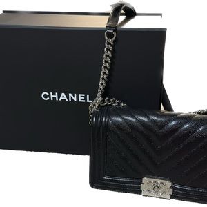 Black medium Chanel chevron caviar boy bag